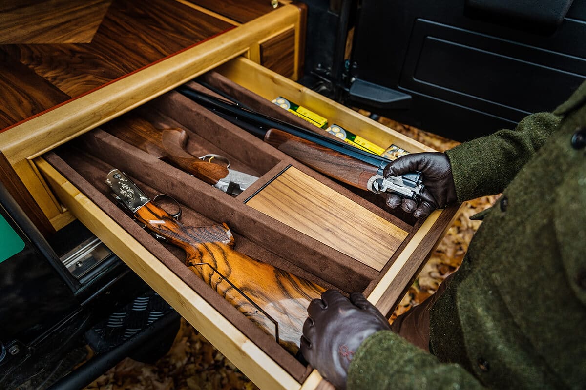 Elizabeth the Land Rover Defender D110: Custom Wood Gun Cabinet