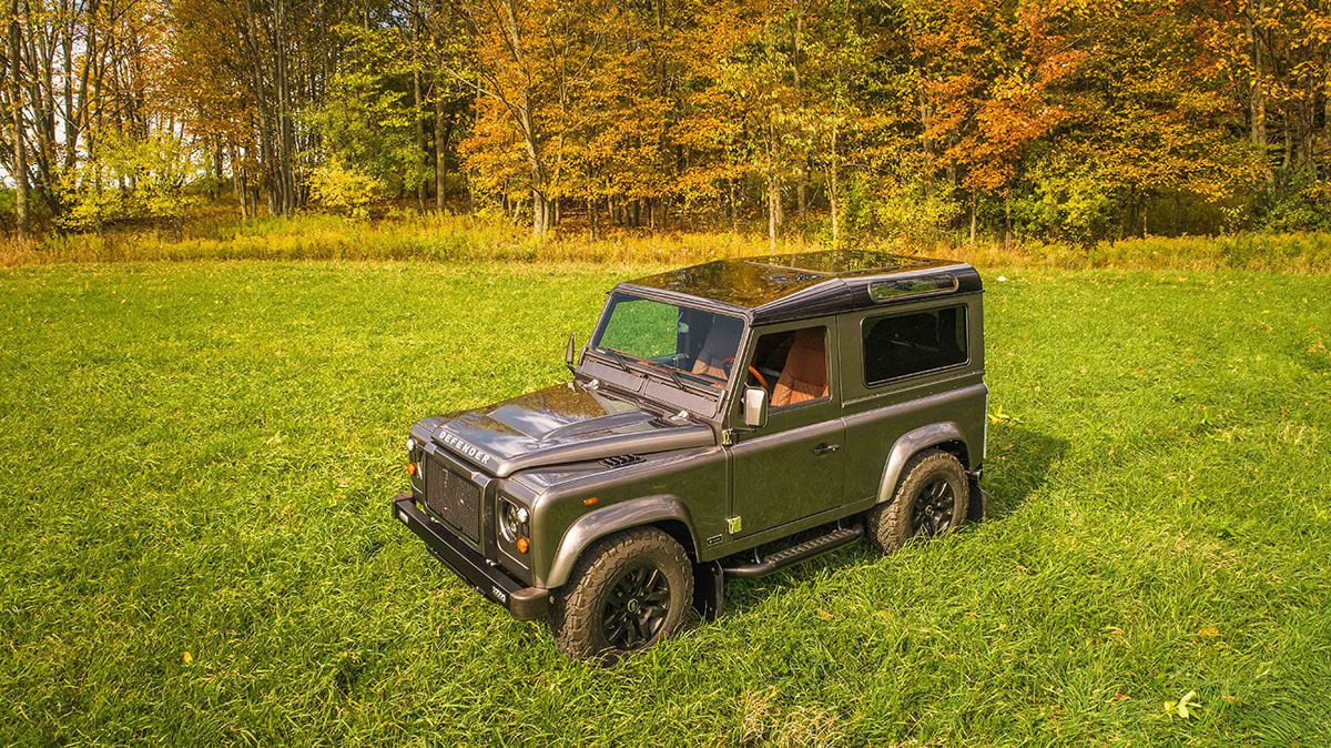Land Rover Defender D90: Exterior Drone Shot 3/4 Side View