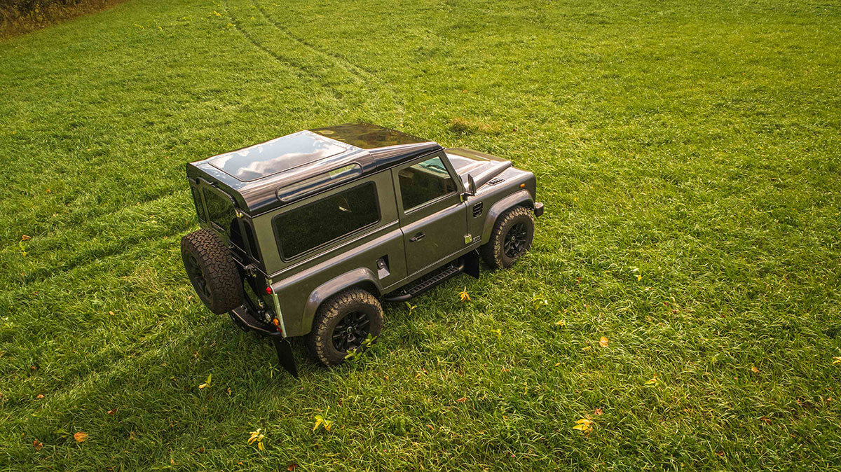 Land Rover Defender D90: Exterior Drone Shot 3/4 Side View