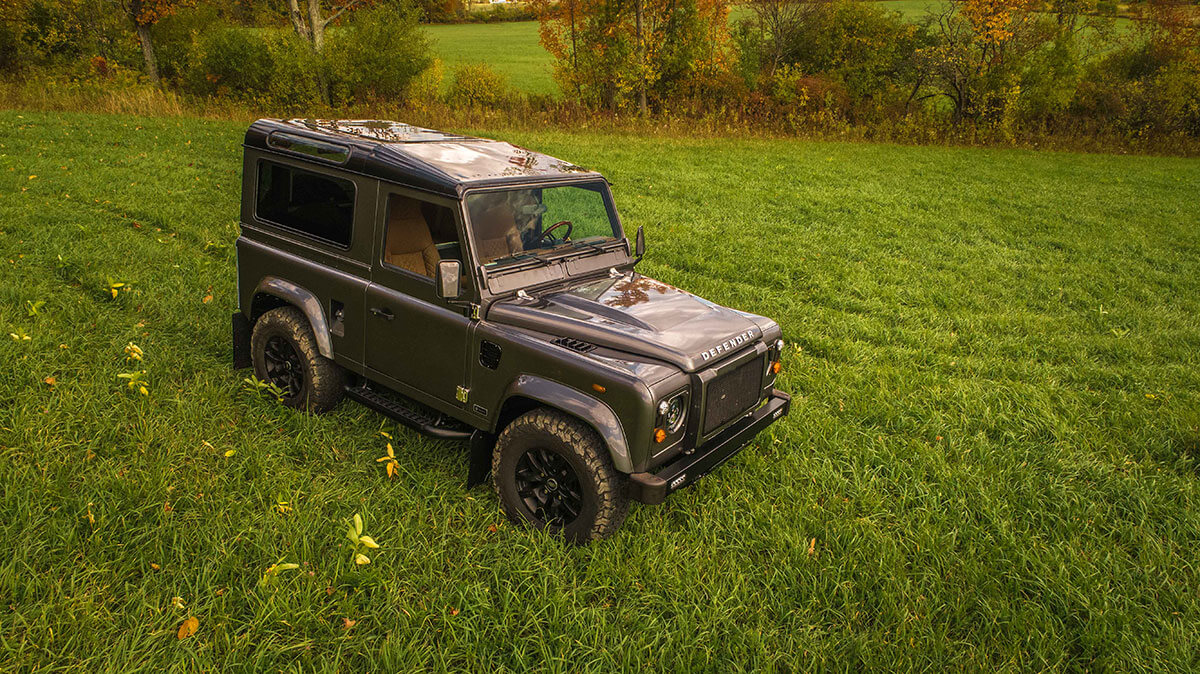 Land Rover Defender D90: Exterior Drone Shot 3/4 Side View