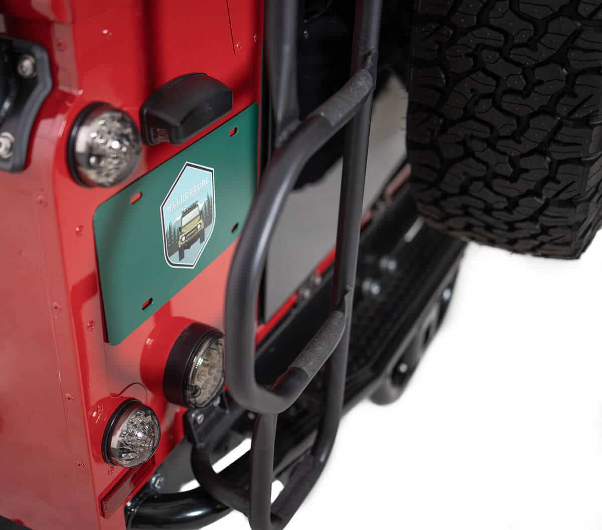 Land Rover Defender D110 - Exterior Details: Helderburg Branding and Roof Access Ladder