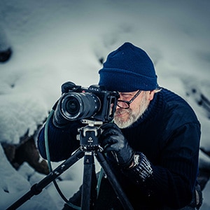 Paul photographing frozen waterfalls