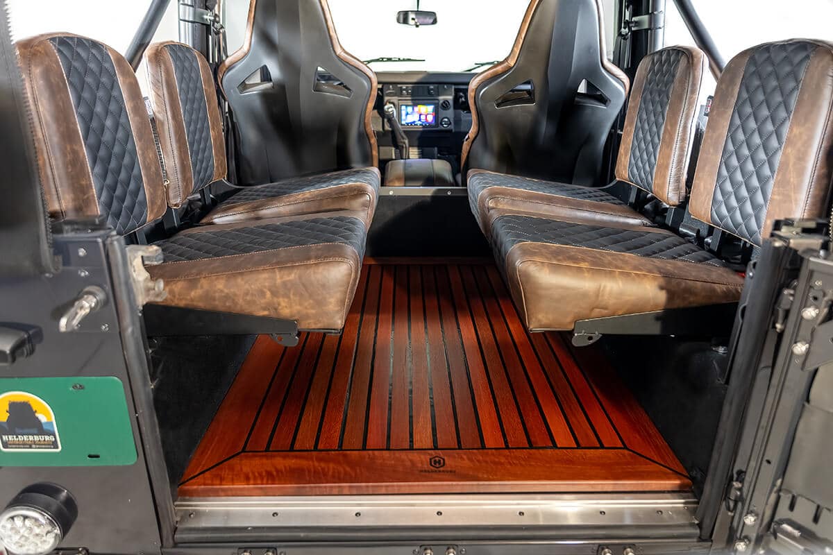 Land Rover Defender D90 Soft Top Interior: Mahogany Floor and Two-toned distressed leather rear seating - Milo
