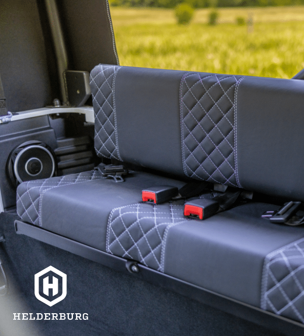 rugged custom defender - rear center facing bench seats