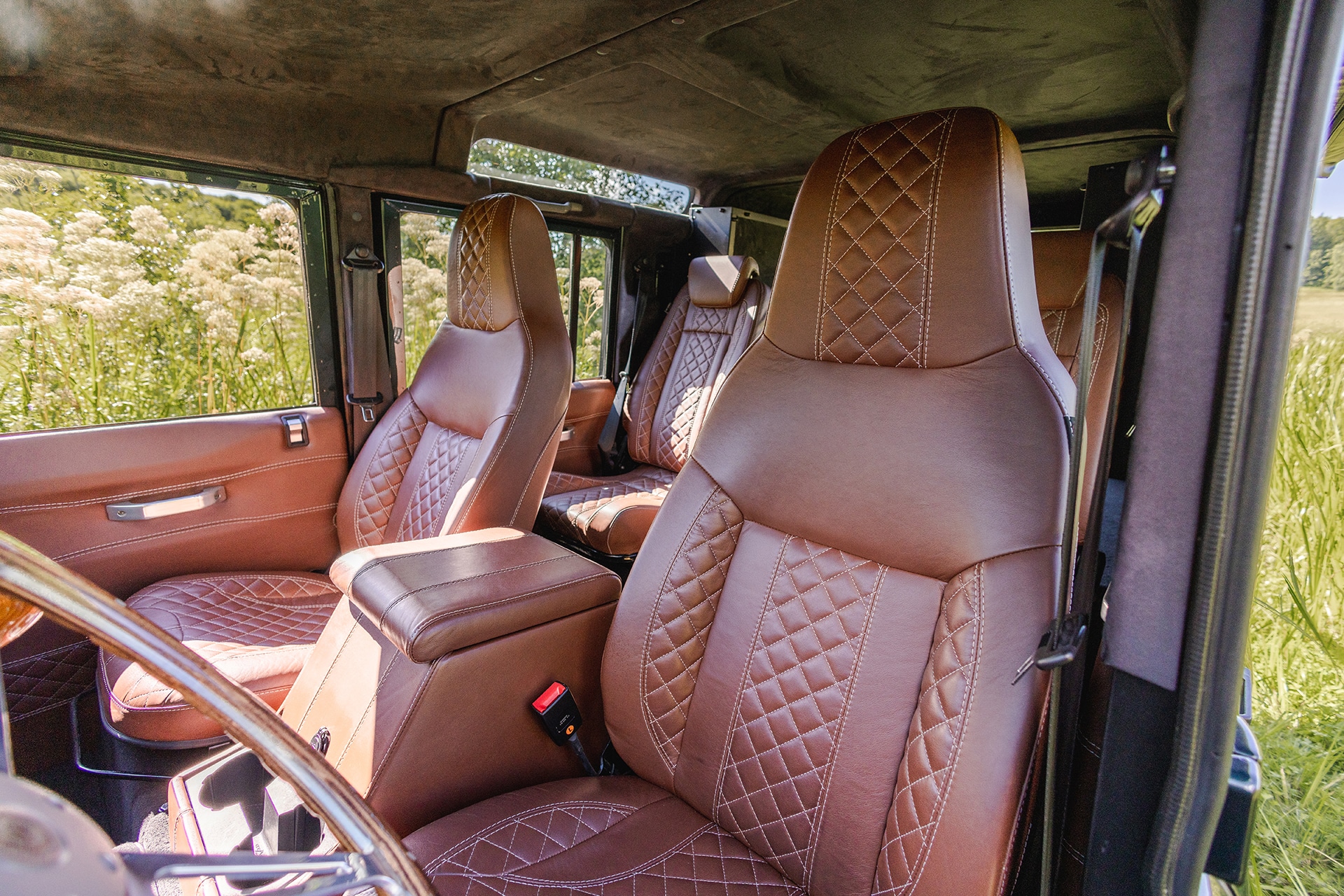 Chesnut Brown Bespoke Leather Seats with White Diamond Stitching