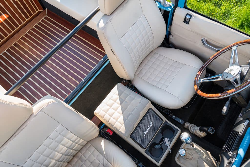 Bespoke Scottish Leather with Billet Aluminum Interior Trim  and Mahogany Cargo wood floor