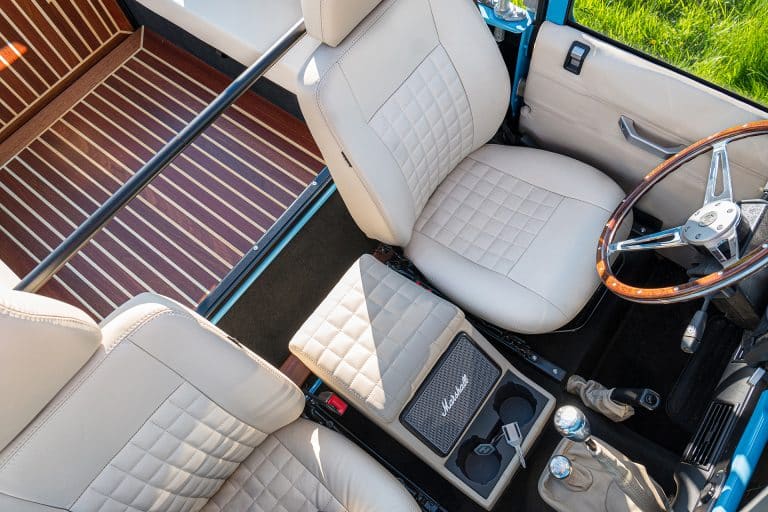Bespoke Scottish Leather with Billet Aluminum Interior Trim  and Mahogany Cargo wood floor