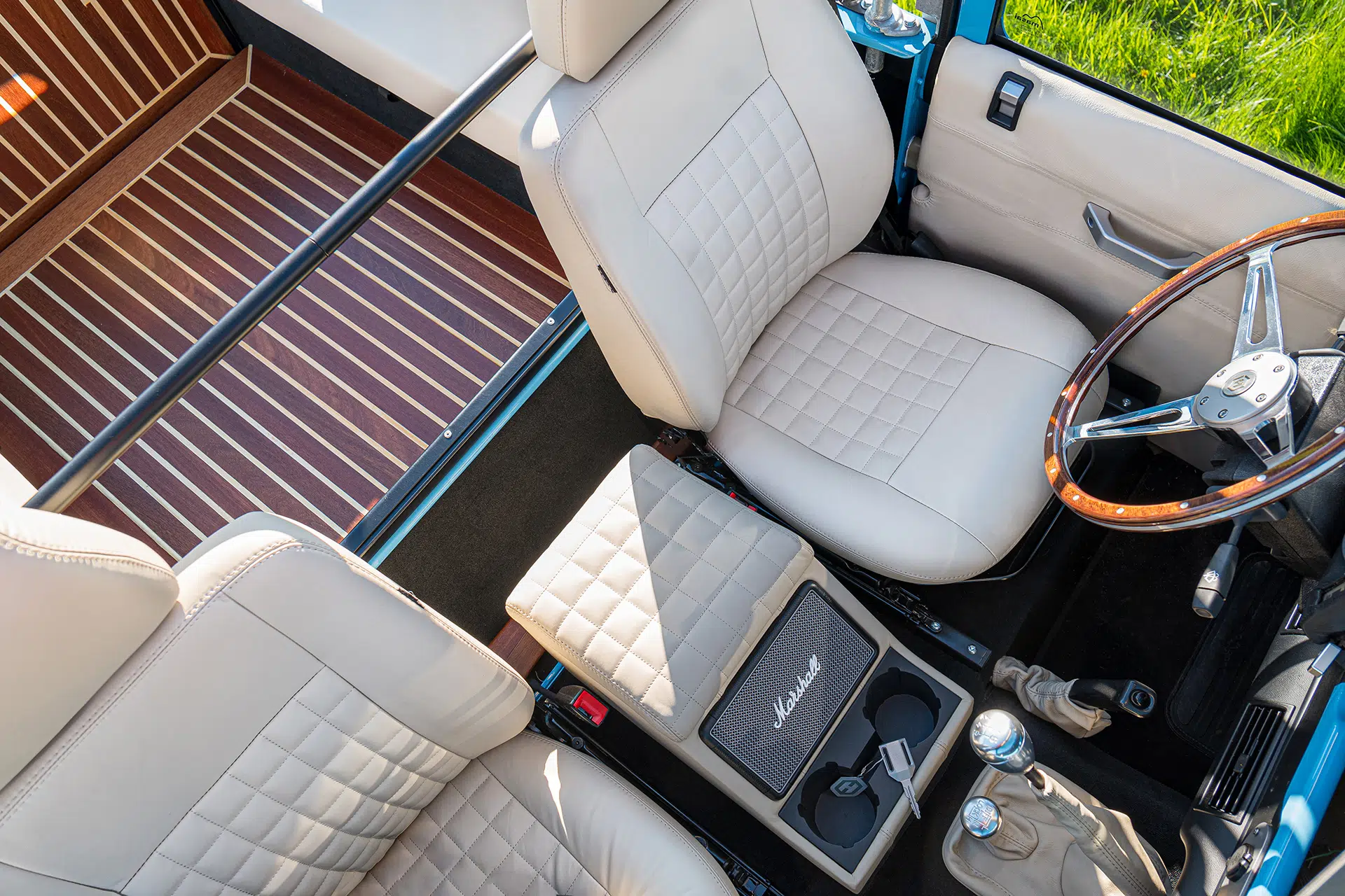 Bespoke Scottish Leather with Billet Aluminum Interior Trim  and Mahogany Cargo wood floor