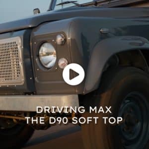 Watch the video - Driving Max the D90 Soft Top Defender