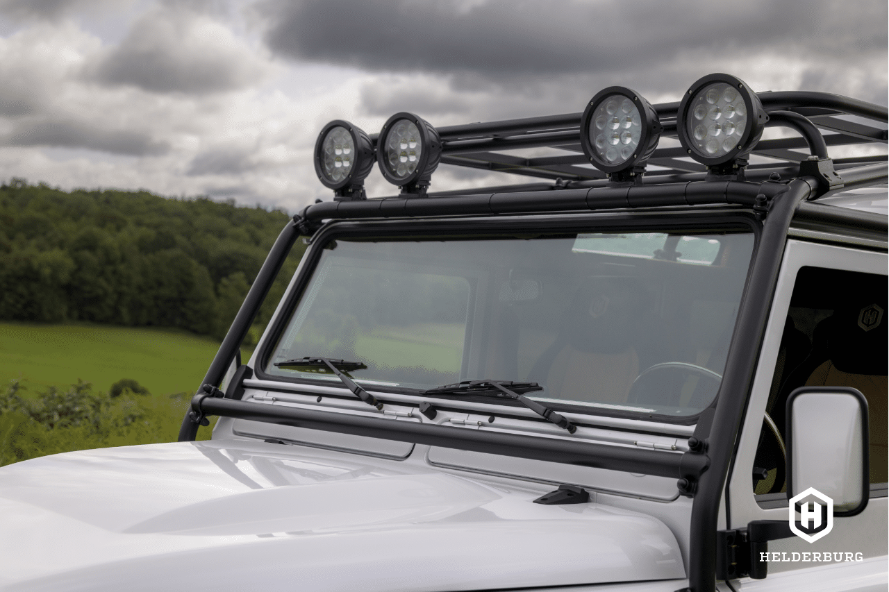 Restored Land Rover Defender 110 - roof lights, roof rack and roll bar detail view