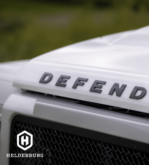 Restored Land Rover Defender 110 - bonnet badge detail view
